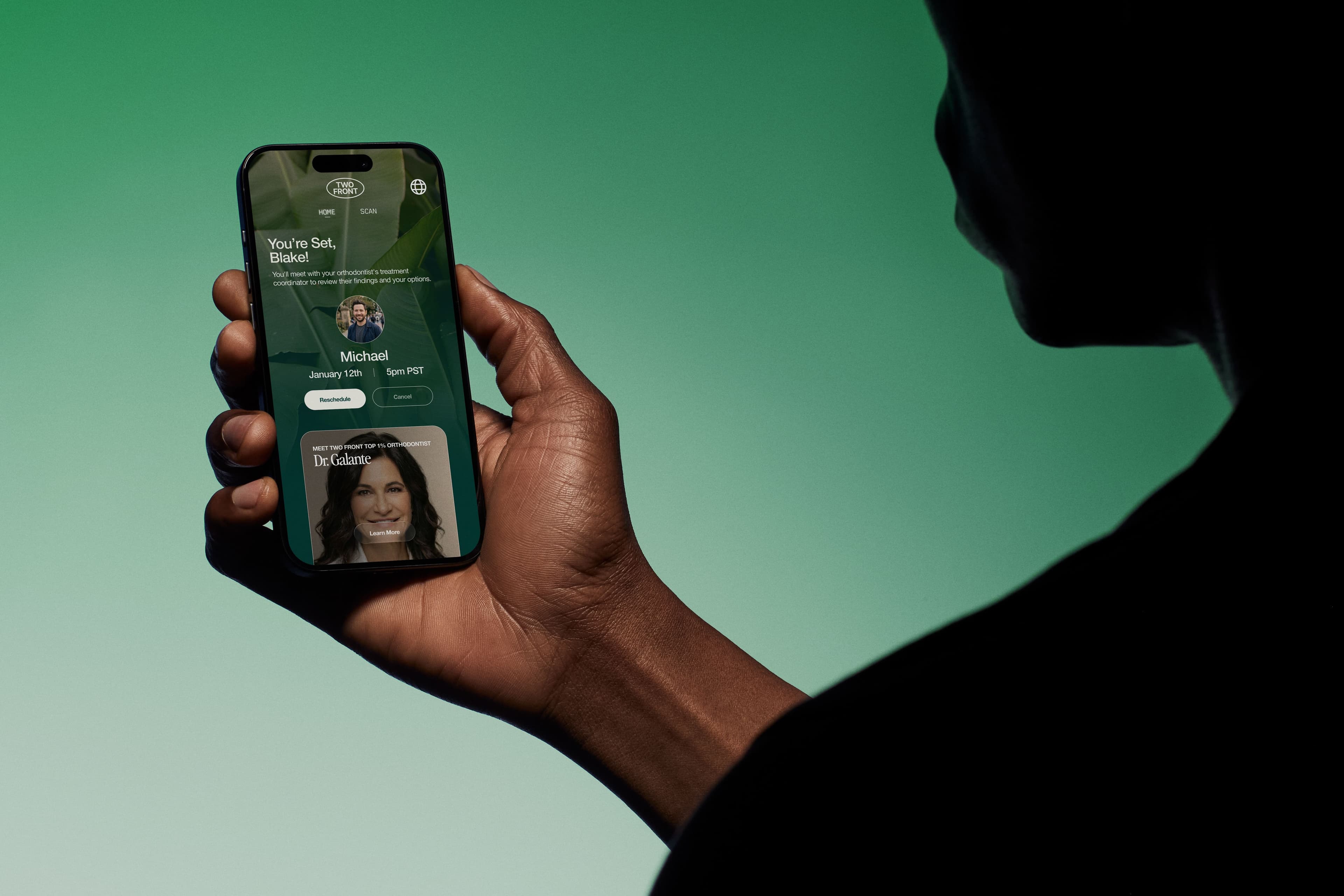 Person holding phone with Two Front app